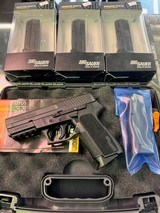 SIG SAUER SP2022 9MM LUGER (9X19 PARA) - 1 of 3