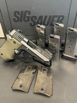 SIG SAUER P938 9MM LUGER (9X19 PARA) - 1 of 2