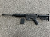 BUSHMASTER Carbon 15 5.56X45MM NATO - 1 of 3