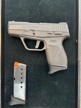 TAURUS 740 SLIM .40 CALIBER - 1 of 2