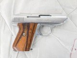 JENNINGS FIREARMS J22 Chrome w/Wood Grips, Magazine .22 LR - 1 of 3