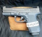 RUGER RXM 9MM LUGER (9x19 PARA) - 1 of 3