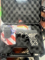 TAURUS GX4 9MM LUGER (9x19 PARA) - 1 of 2