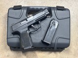 SIG SAUER P365 XL 9MM LUGER (9X19 PARA) - 1 of 3