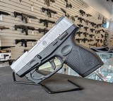 TAURUS 709 SLIM 9MM LUGER (9x19 PARA) - 1 of 2