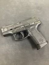 TAURUS PT140 PRO MILLENIUM .40 S&W - 1 of 3