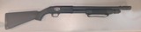 MOSSBERG 500 BLACKWATER 12 GA - 1 of 3