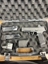 SIG SAUER P365 XL 9MM LUGER (9x19 PARA) - 1 of 3