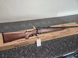 SAVAGE ARMS SAV AXIS II XP HARDWOOD 6.5MM CREEDMOOR - 1 of 1