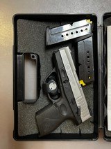 TAURUS 709 SLIM FS 9MM LUGER (9x19 PARA) - 1 of 3