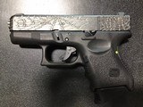 GLOCK G27 Gen 3 Subcompact .40 CALIBER - 1 of 3