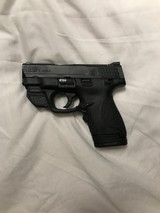SMITH & WESSON M&P 9 Shield w/ Green Crimson Trace 9MM LUGER (9x19 PARA) - 1 of 3