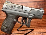 TAURUS PT140 PRO MILLENIUM .40 S&W - 2 of 3