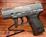 TAURUS PT140 PRO MILLENIUM .40 S&W - 1 of 3