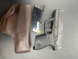TAURUS 709 SLIM 9MM LUGER (9x19 PARA) - 1 of 3