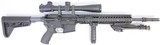 LMT DEFENSE LMT DEFENDER 2000 5.56 18" SPR NOVESKE LEUPOLD MARK 4 LRT 3.5-10X40 SCOPE AAC MITER FH 5.56X45MM NATO - 1 of 3