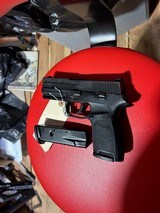 SIG SAUER P250 .40 CALIBER - 2 of 2