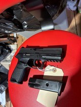 SIG SAUER P250 .40 CALIBER - 1 of 2