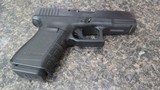 GLOCK 23 .40 CALIBER - 2 of 2