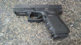 GLOCK 23 .40 CALIBER - 1 of 2