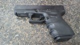 GLOCK 23 .40 CALIBER - 1 of 2