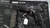 SIG SAUER P226
MK25 9MM LUGER (9x19 PARA) - 1 of 3