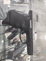 RUGER SR9C 9MM LUGER (9x19 PARA) - 1 of 3