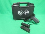 RUGER RXM 9MM LUGER (9x19 PARA) - 1 of 3