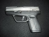 TAURUS PT 709 Slim 9MM LUGER (9x19 PARA) - 1 of 3
