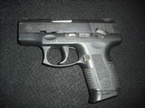 TAURUS PT140 PRO MILLENIUM .40 CALIBER - 2 of 3