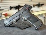 RUGER SR9C 9MM LUGER (9x19 PARA) - 2 of 2