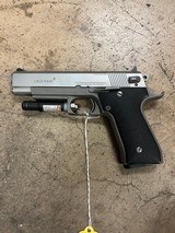 LASERAIM ARMS, INC. Laser
Aim .45 ACP