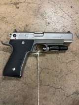 LASERAIM ARMS, INC. Laser
Aim .45 ACP - 2 of 3