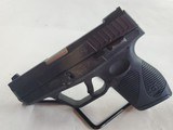 TAURUS 709 slim 9MM LUGER (9x19 PARA) - 1 of 3
