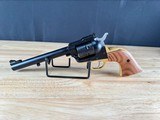 RUGER SUPER WRANGLER (MIDNIGHT BLUE & BRASS) .22 LR & .22 MAG - 1 of 3