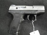 TAURUS PT140 Pro Millennium w/Magazine, Two Tone Stainless .40 S&W - 1 of 3