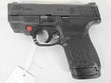 SMITH & WESSON M&P9 M2.0 Shield w/Crimson Trace Red Laser Grips, Magazine 9MM LUGER (9x19 PARA) - 1 of 3