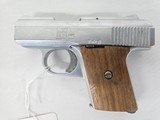 RAVEN ARMS MP25 Chrome, Wood Grips, w/Magazine .25 ACP - 1 of 3
