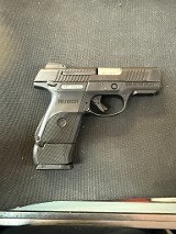 RUGER SR9C 9MM LUGER (9x19 PARA) - 1 of 2