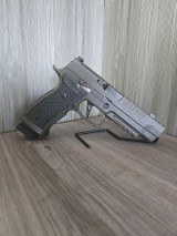 SIG SAUER P320 AXG LEGION9MM LUGER (9x19 PARA) - 1 of 3