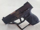 TAURUS 709 slim 9MM LUGER (9x19 PARA) - 1 of 3
