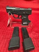 TAURUS 709 SLIM FS 9MM LUGER (9x19 PARA) - 1 of 3