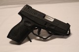 TAURUS 709 SLIM FS 9MM LUGER (9x19 PARA) - 1 of 3