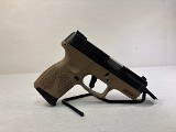 TAURUS G2C FDE/BLK 9MM LUGER (9X19 PARA) - 1 of 3