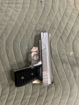 BRYCO ARMS JENNINGS NINE - STAINLESS 9MM LUGER (9x19 PARA) - 1 of 2