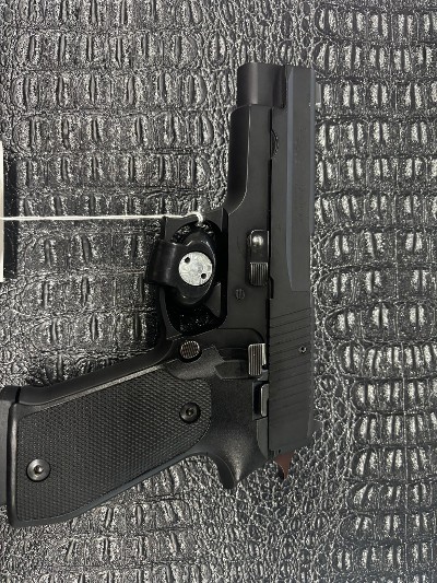 SIG SAUER P220 .45 AUTO RIM