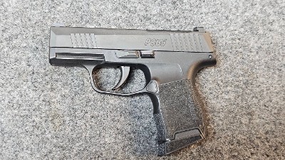 SIG SAUER P365 CHAMBERED IN .380 ACP .380 ACP