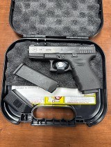 GLOCK 23 .40 CALIBER - 1 of 3