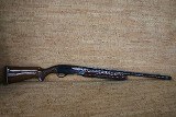 REMINGTON 1100 engraved 12 GA - 1 of 3