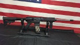 FIREARMS INTERNATIONAL CORP. OMNI HYBRID RIFLE 5.56X45MM NATO - 1 of 3